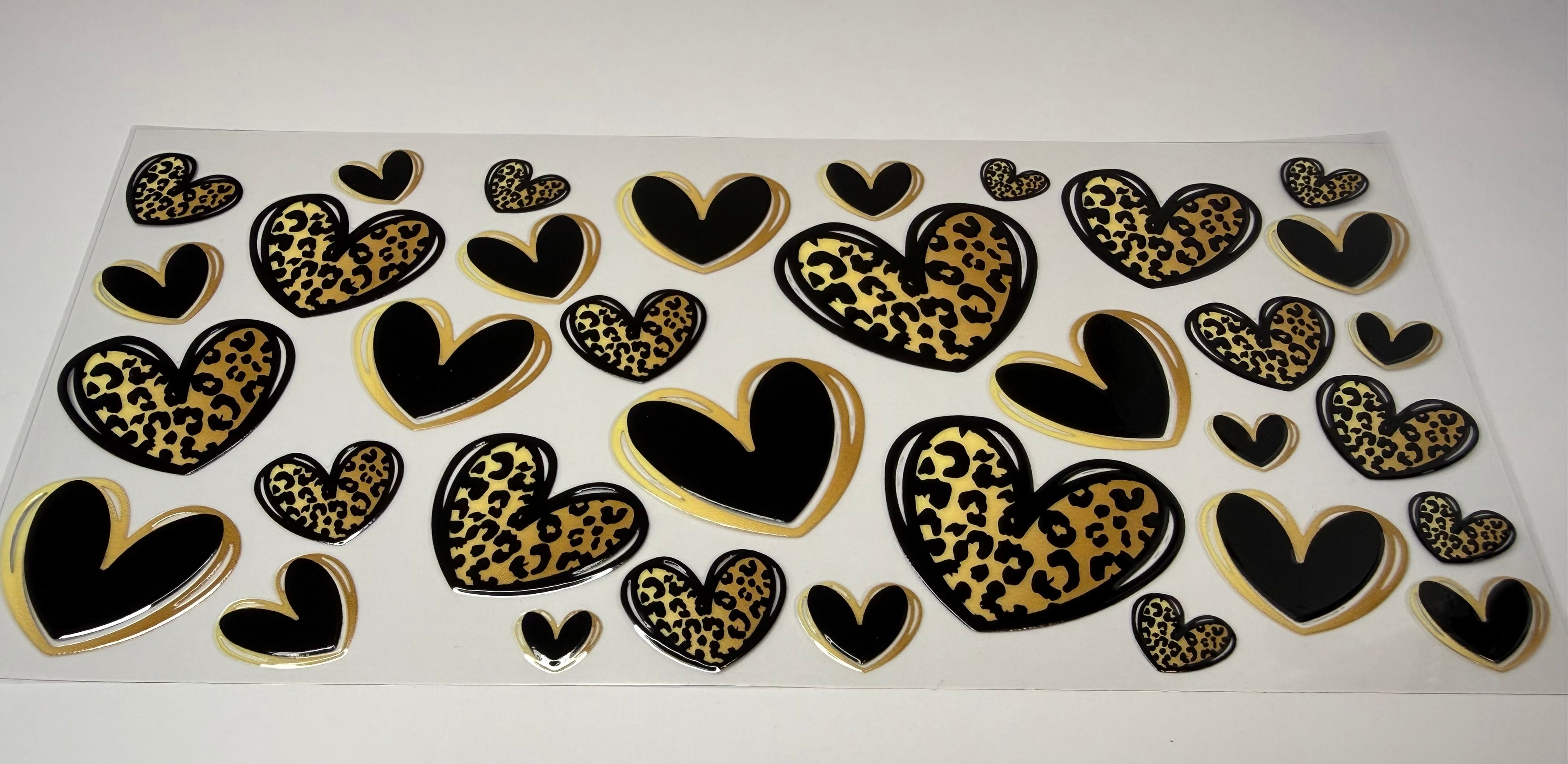 #94- BLACK AND GOLD CHEETAH HEARTS